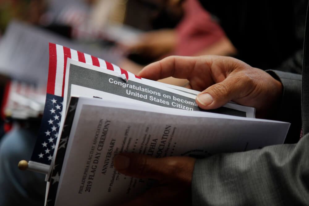 immigrants from 12 different countries become new U.S. citizens in a special naturalization ceremony on Flag Day at the historic Betsy Ross House.