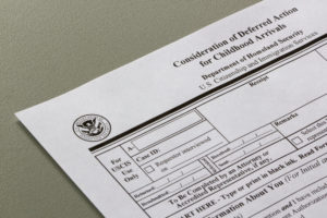 Portland, OR, USA - Jun 20, 2020: Closeup of USCIS Form I-821D, Consideration of Deferred Action for Childhood Arrivals.